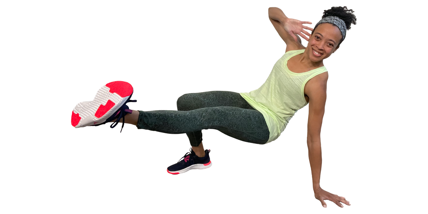 Tasha doing a Fitness Blender workout video